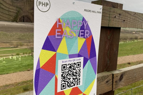 Easter Egg Hunt board on fence